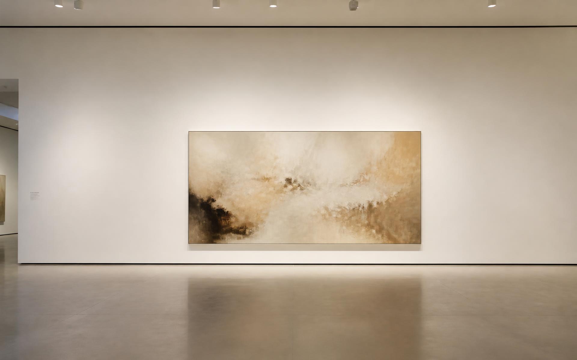 A large abstract painting in warm neutrals on a white gallery wall
